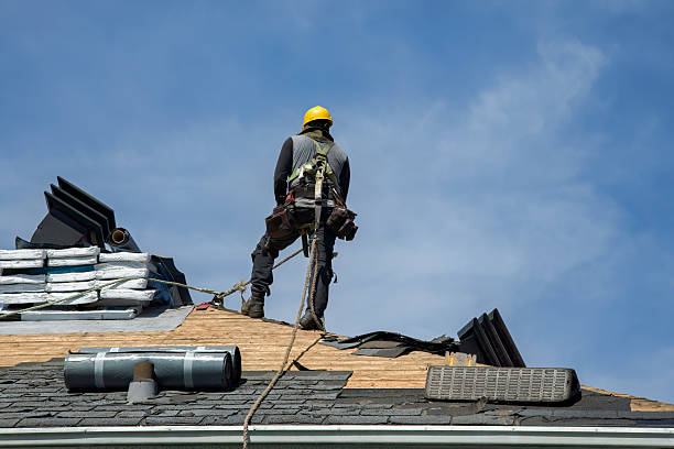 Professional Gutter Installation technician working in La Honda, CA